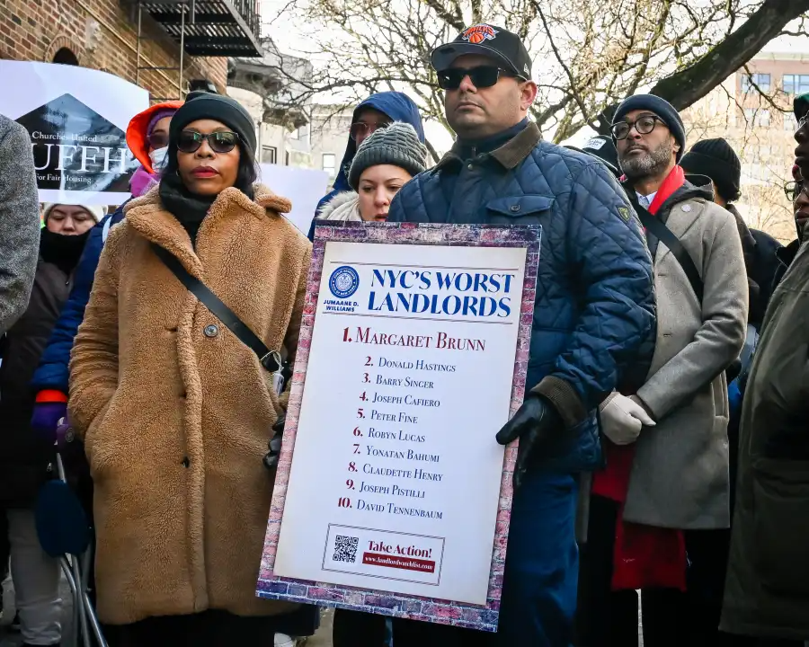 people holding signs