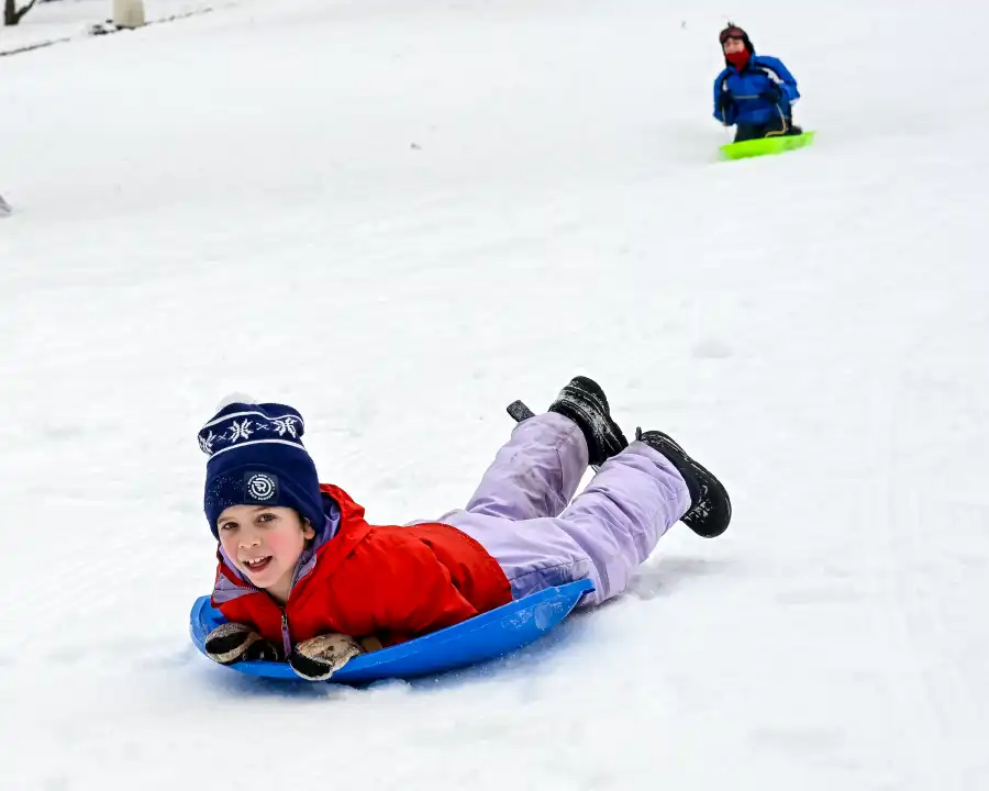 child on a sled