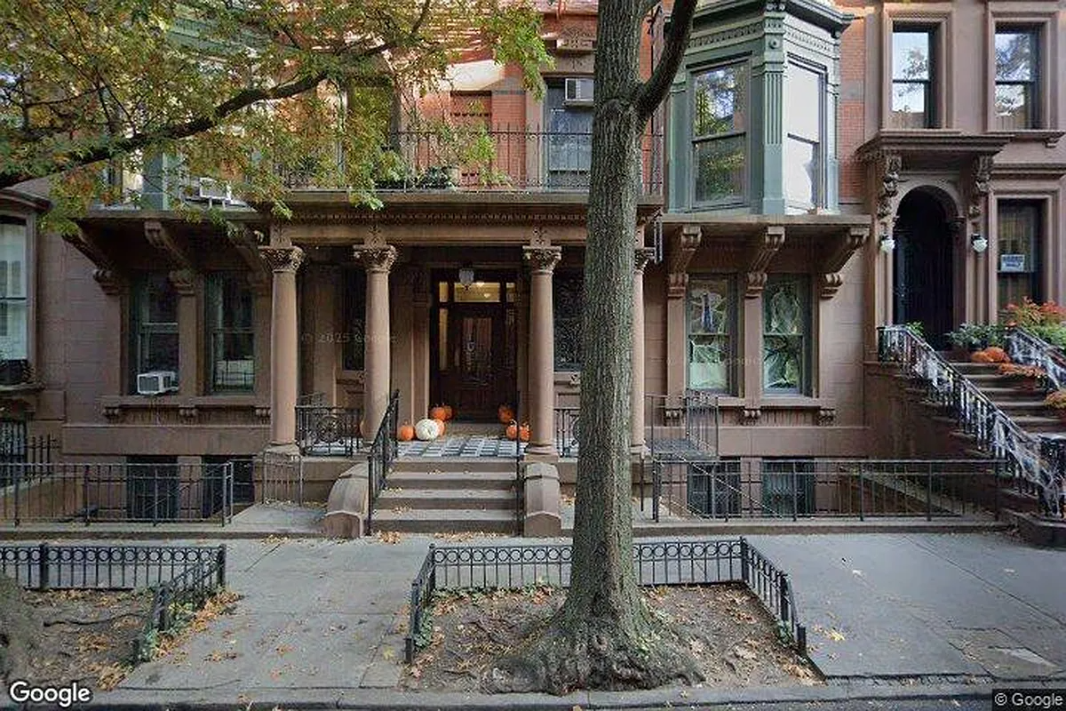 brownstone exterior with columned entry