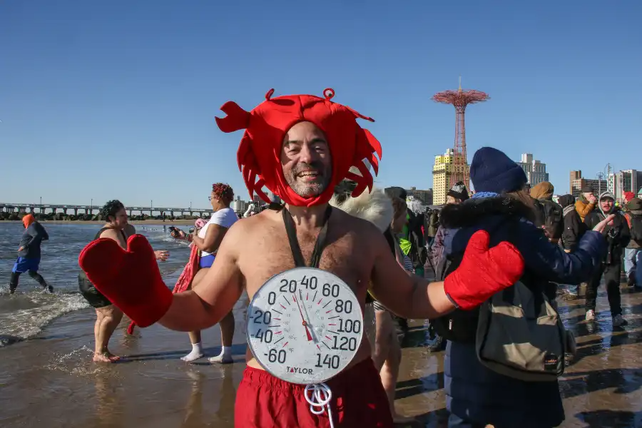 One swimmer channeled the heat as a boiling crab.
