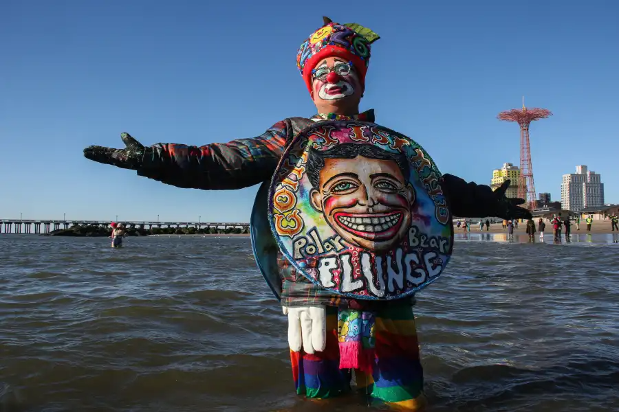 swimmer dressed as a clown