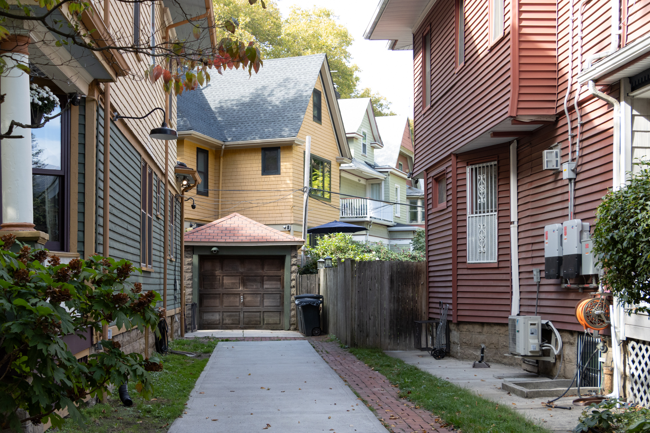 driveway leading to a small garage