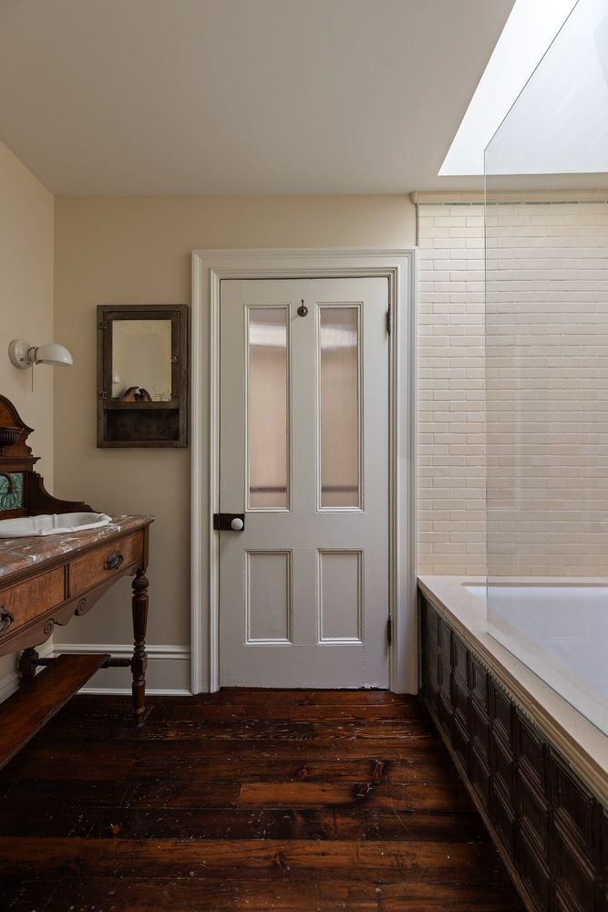 bathroom with vintage dresser turned vanity
