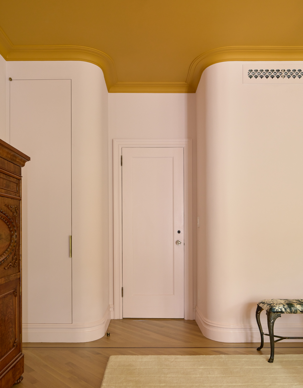 WHITE CLOSETS IN YELLOW BEDROOM