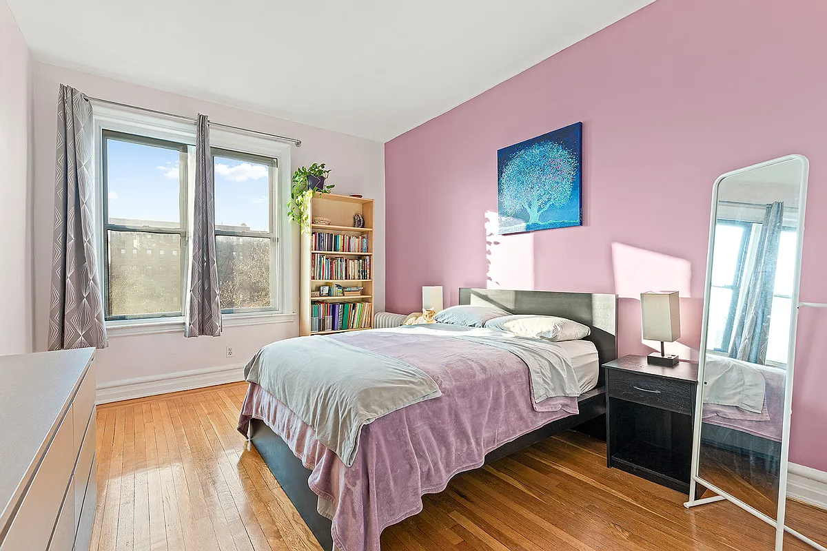 bedroom with a purple wall