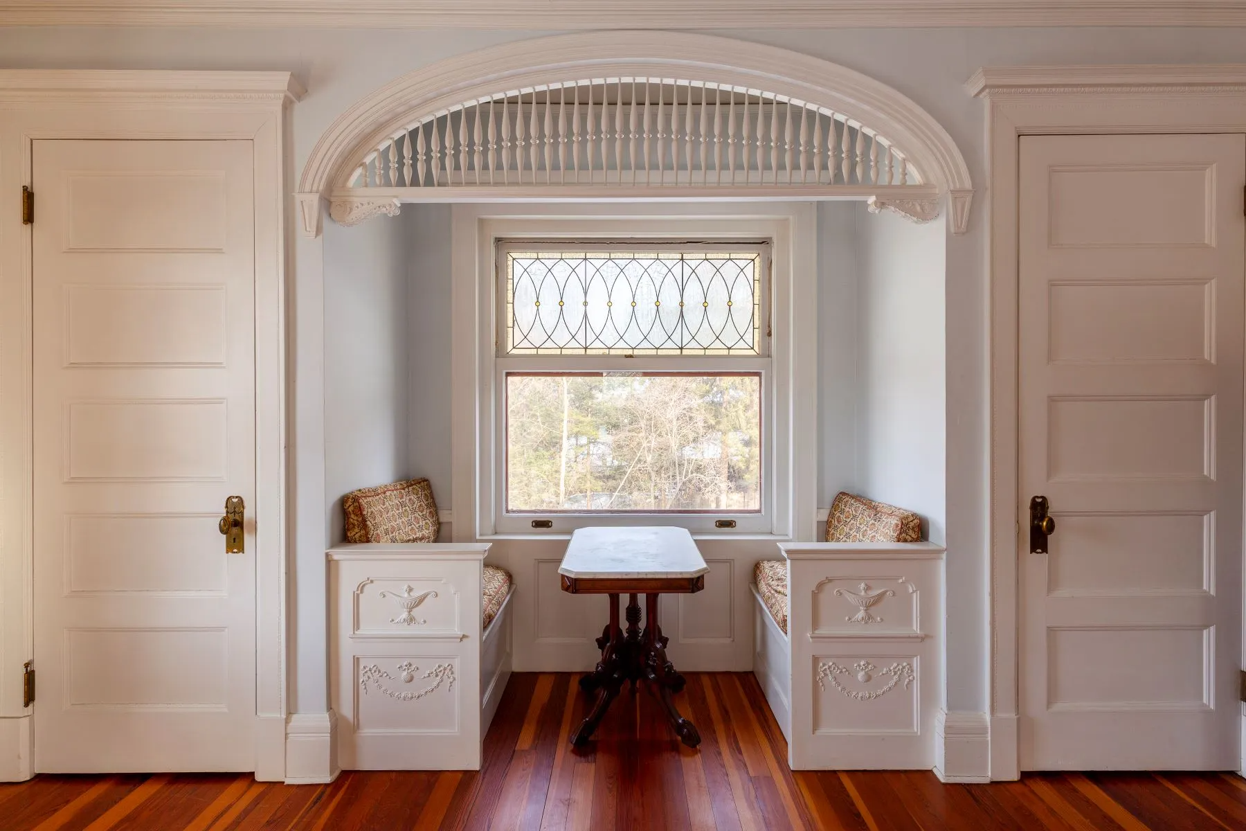 bedroom with a nook with built-in benches