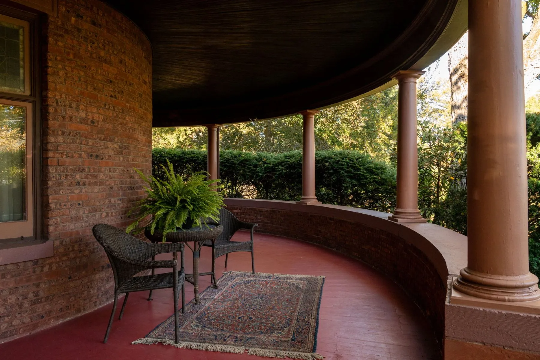 front porch with wicker furniture