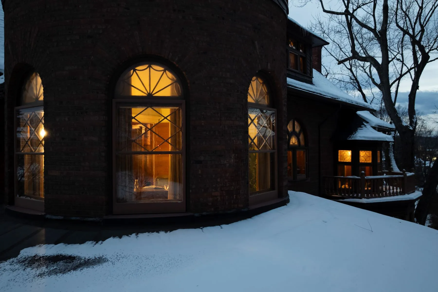 snow covered view of the house