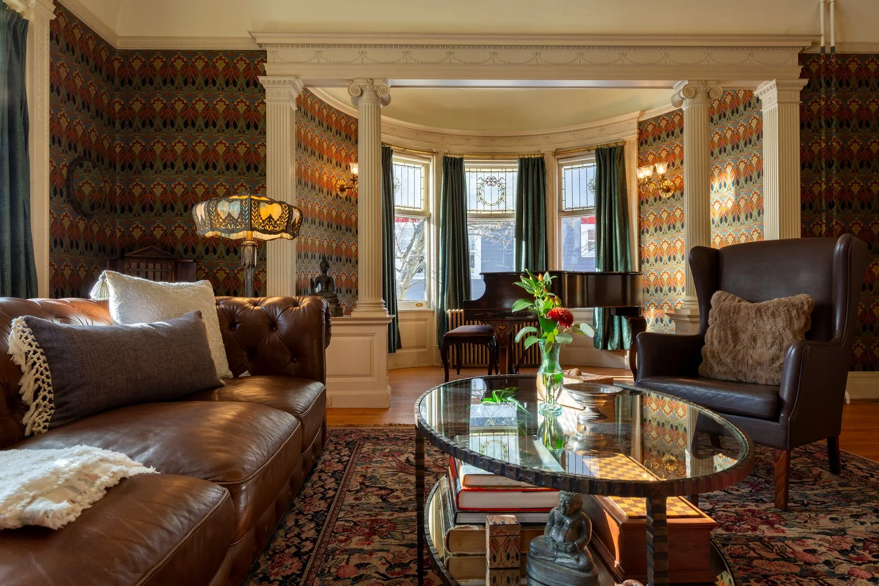 parlor with columned screen to bay window