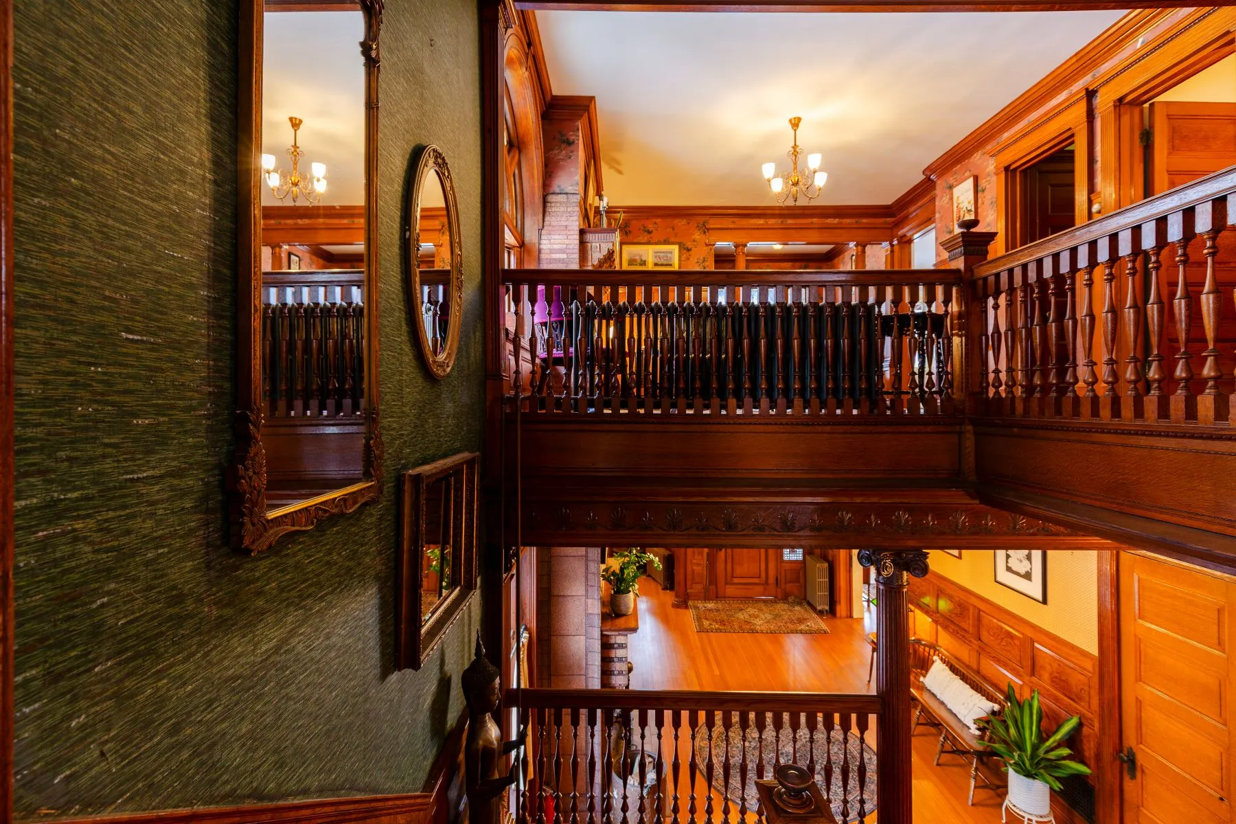 stair hall with wallpaper