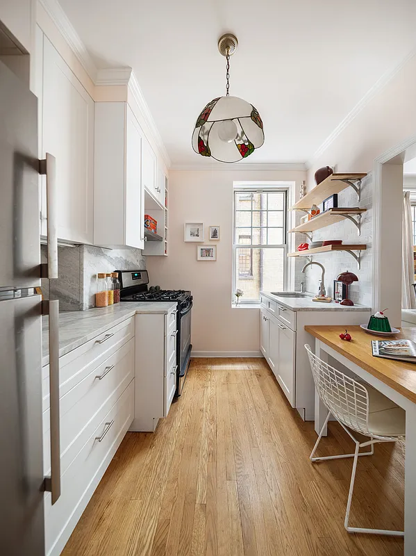 kitchen with white cabinets, open shelving