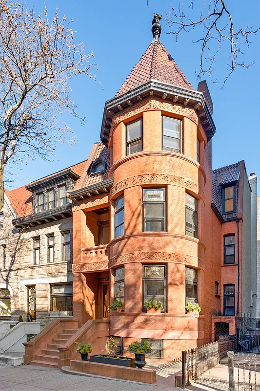 brick rowhouse with corner tower
