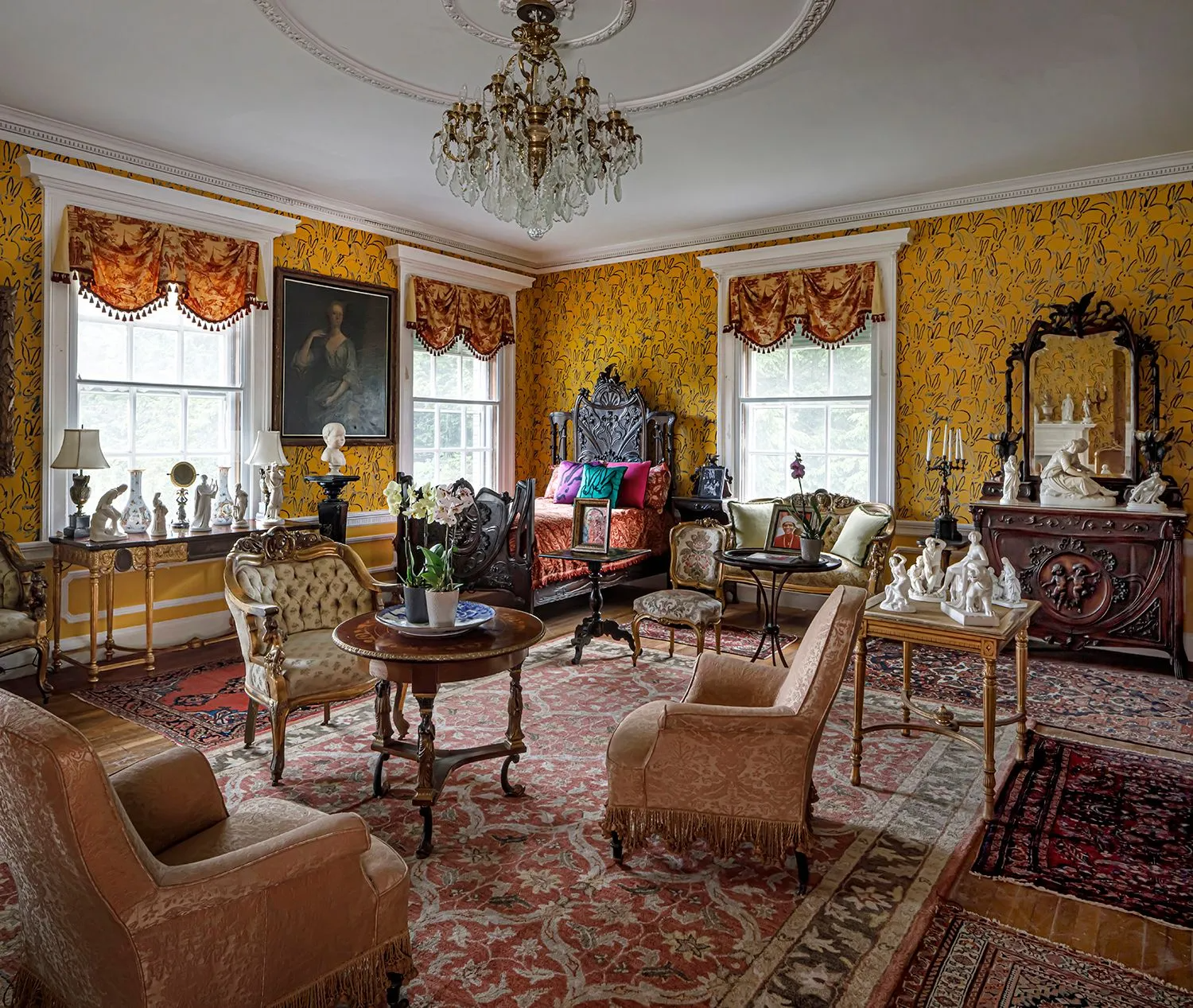 large bedroom with bedroom with yellow bunny wallpaper, two exposures