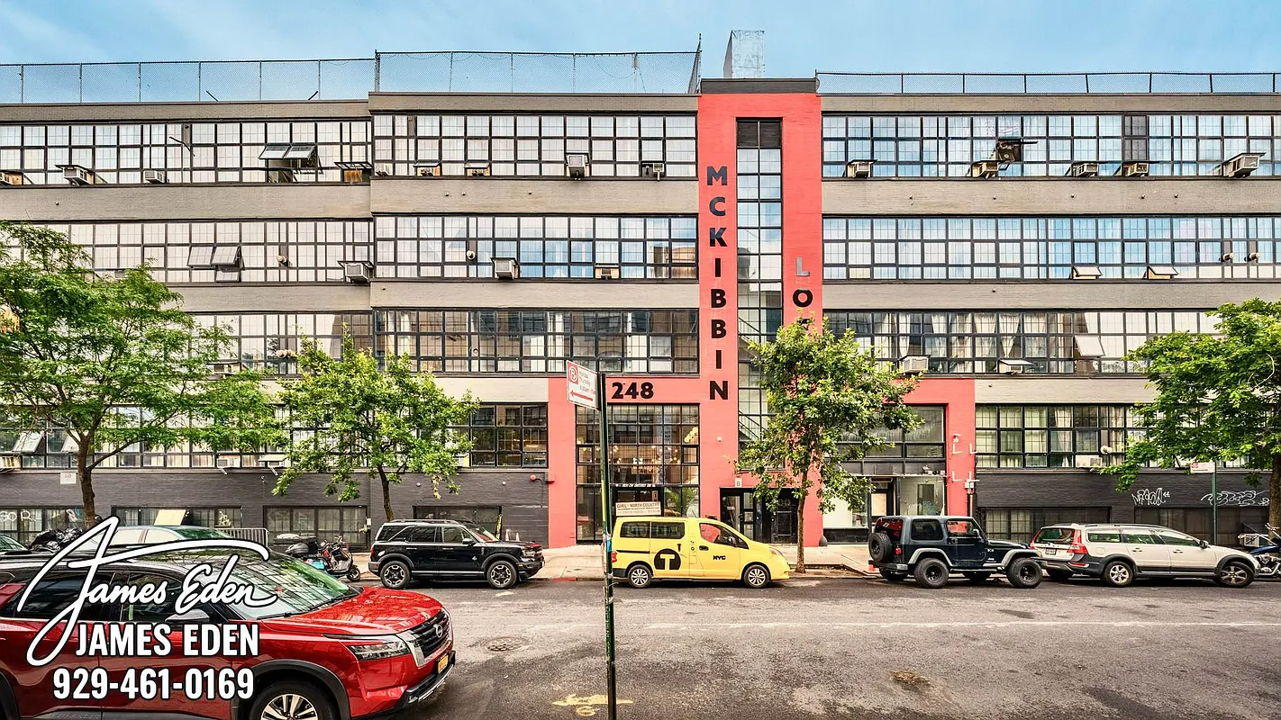 converted building exterior with red band on mckibbin loft signage
