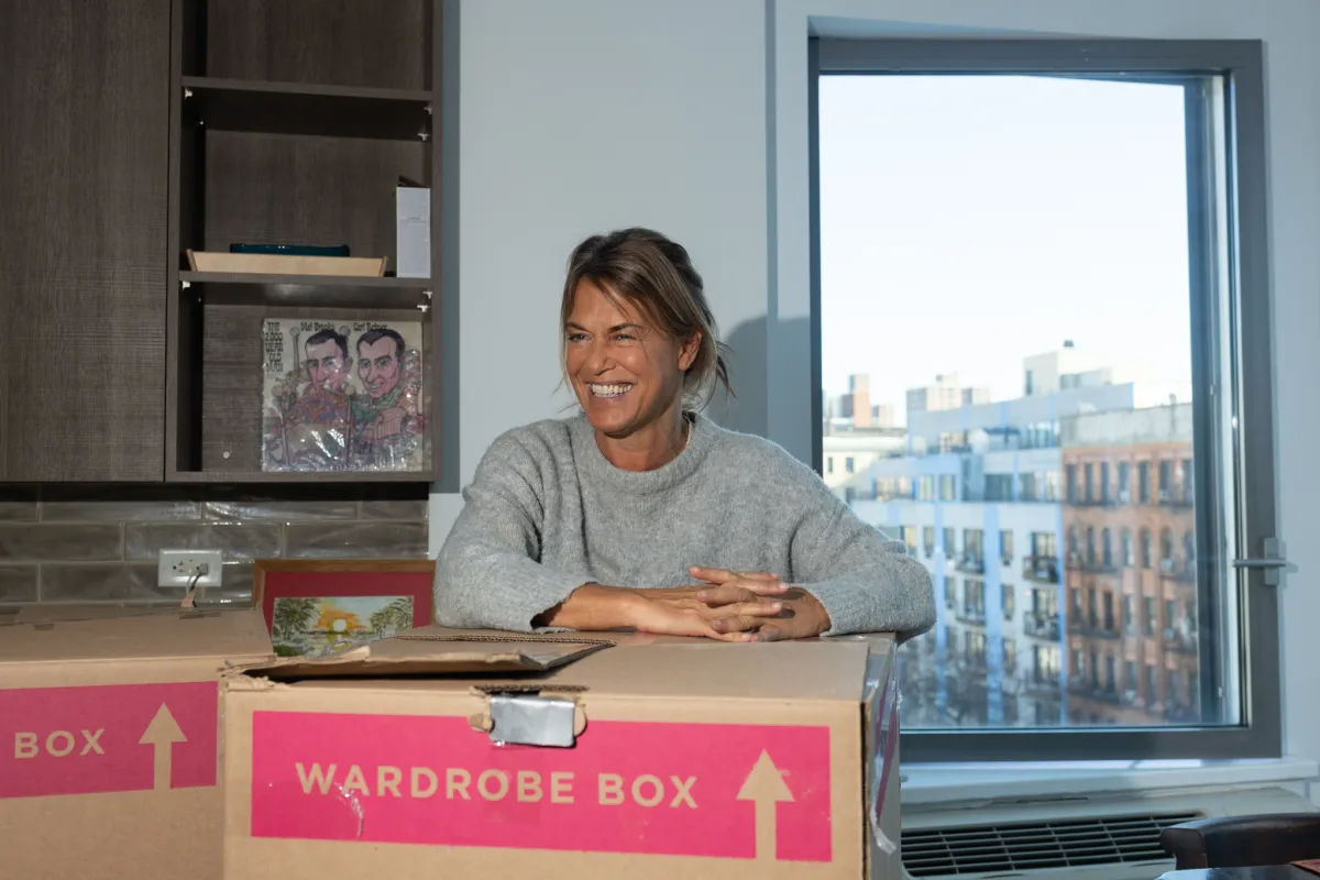 person packing boxes