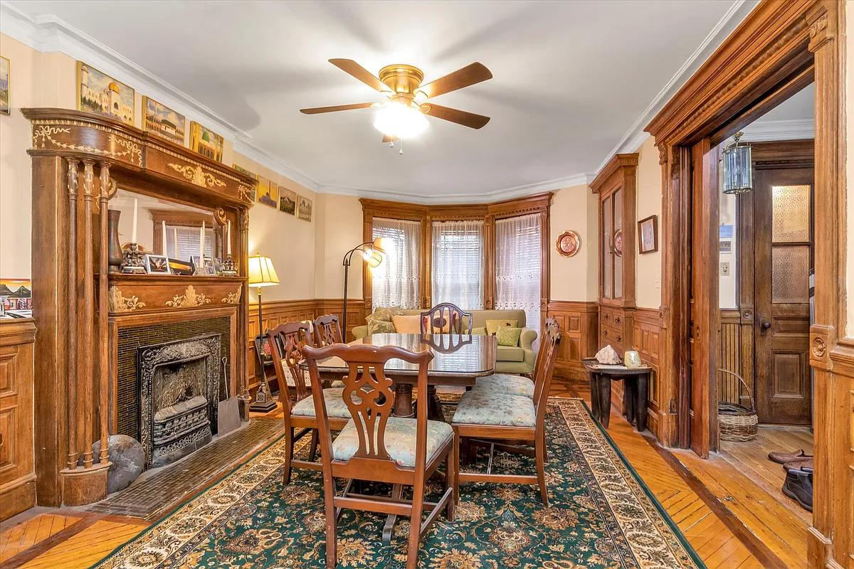 garden level dining room with mantel