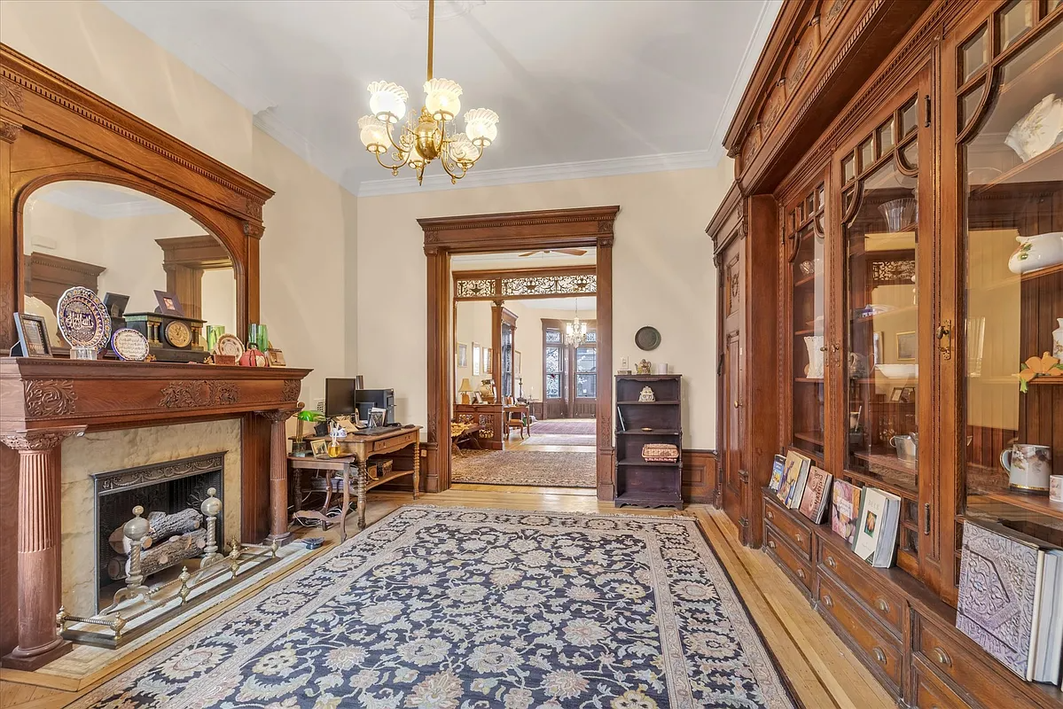 rear parlor with built-ins, mantel