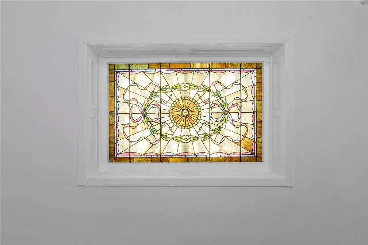 stained glass window with ribbons design