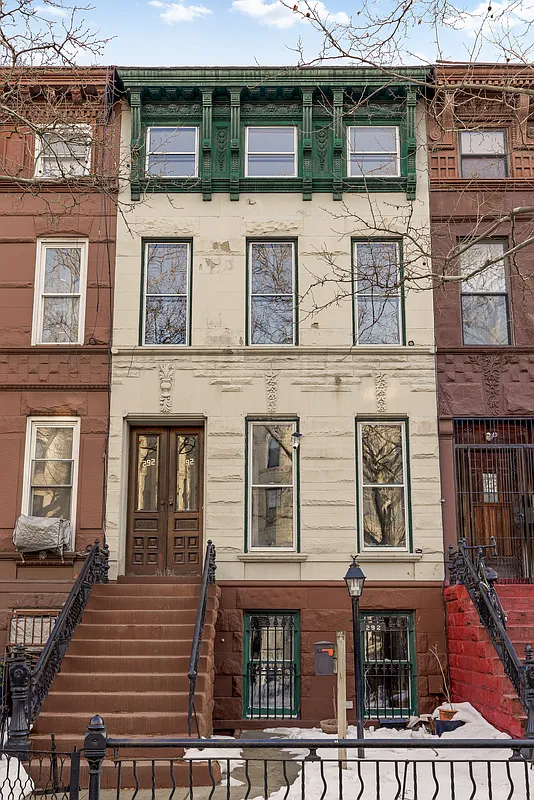 exterior of a terraced house with a sidewalk