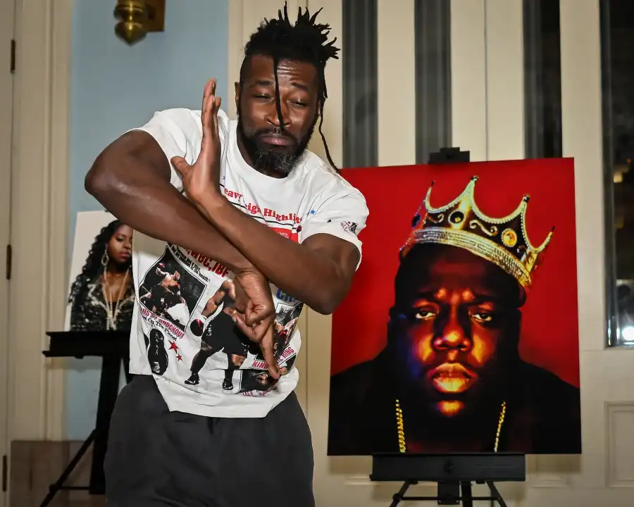 The exhibition includes Barron Claiborne’s renowned portrait of The Notorious B.I.G., the iconic image that helped cement the late rapper’s legacy as “The King of New York.”