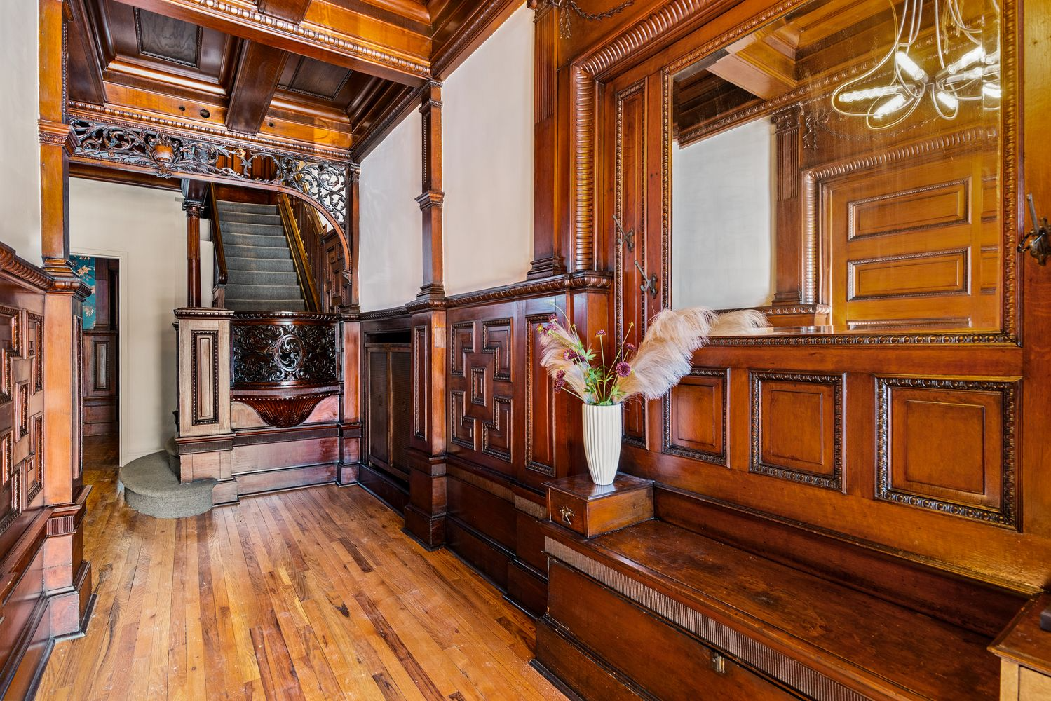 entry with wainscoting, built-in bench and more details
