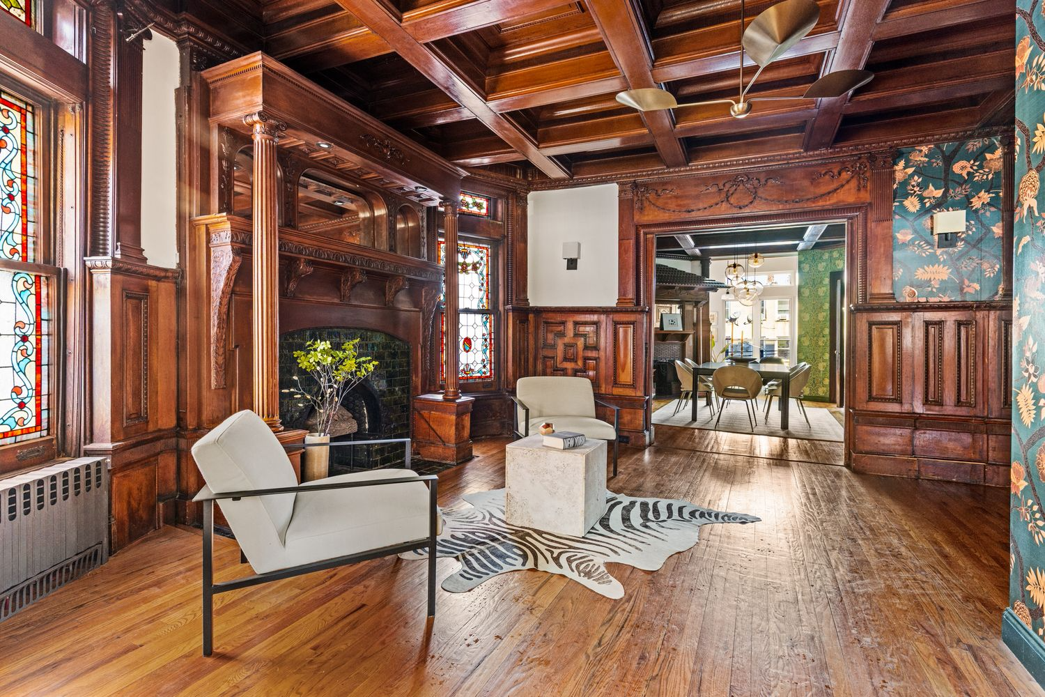 middle parlro with wainscoting, columned mantel