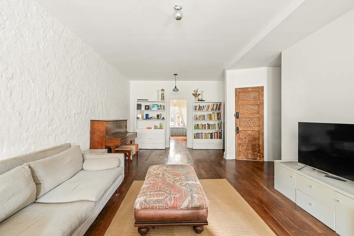 living room with textured white walls