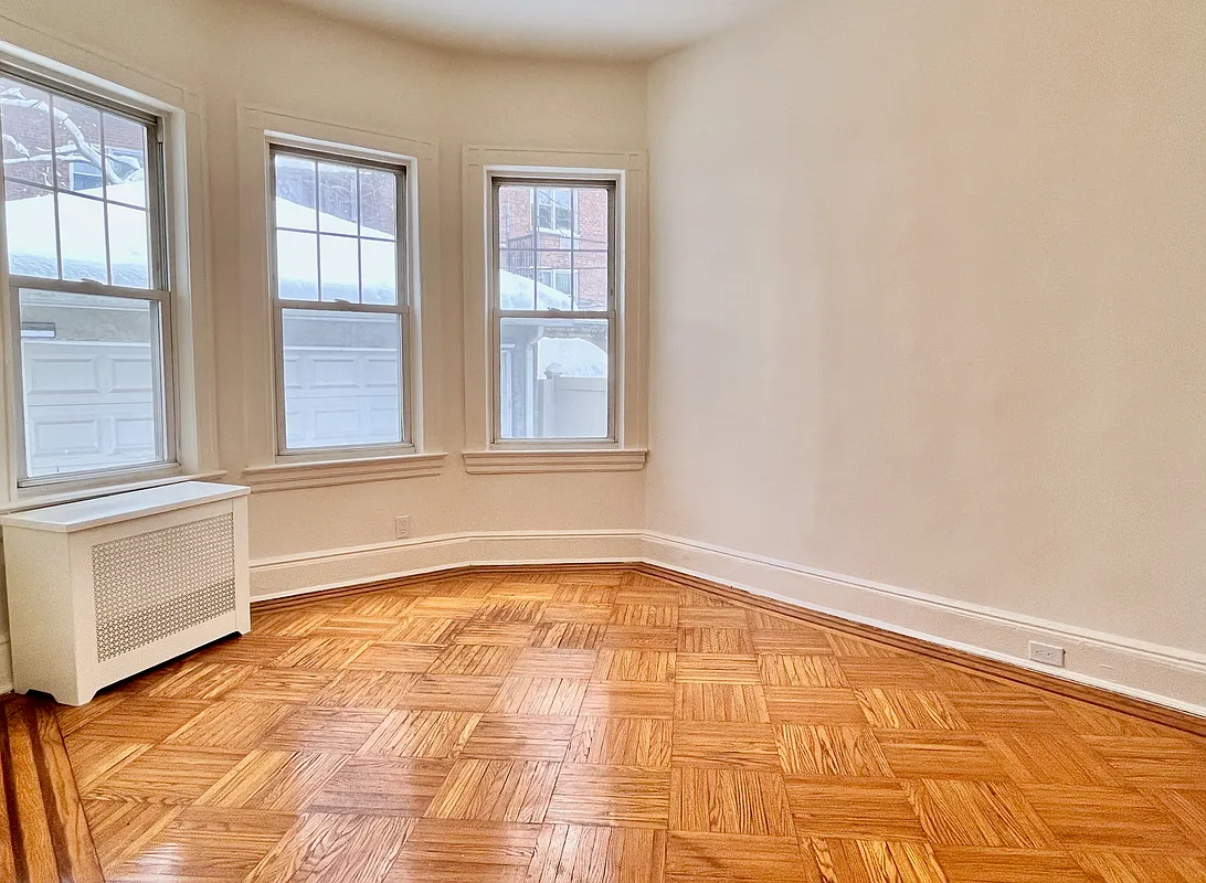 room with three windows