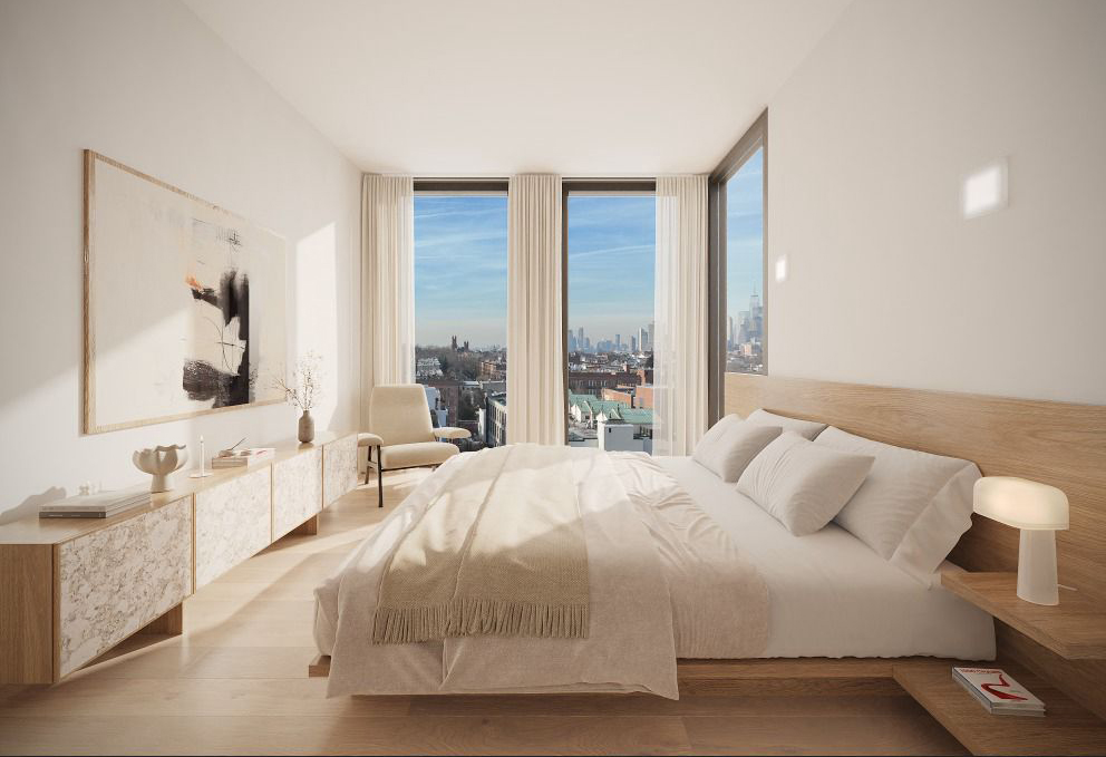 bedroom with floor to ceiling windows on two exposures