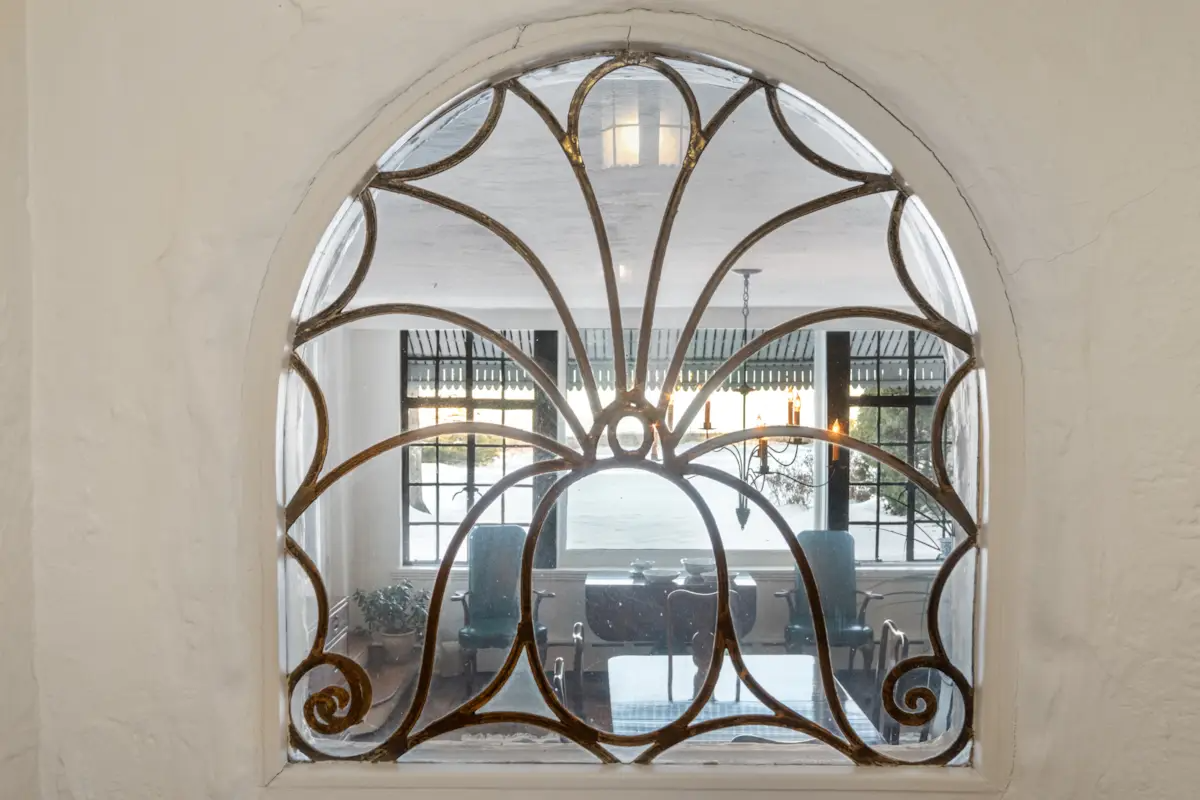 leaded glass window with view into dining room