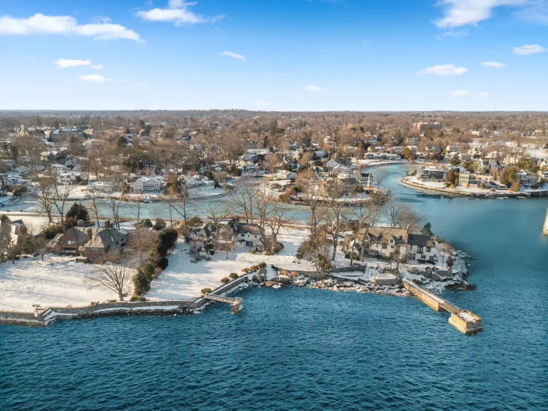 aerial view showing island and four houses