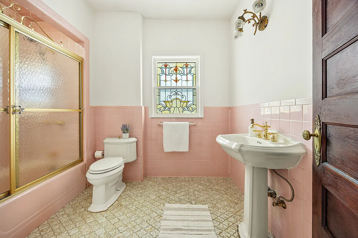 bathroom with vintage pink tile