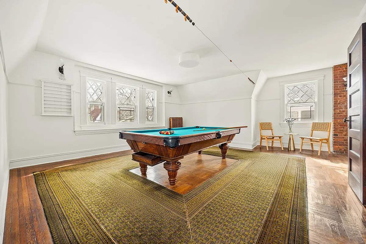 top floor billiard room with wood floor