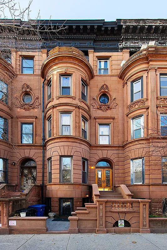 brownstone exterior with rounded bay