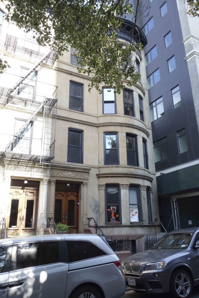 limestone house with rounded bay