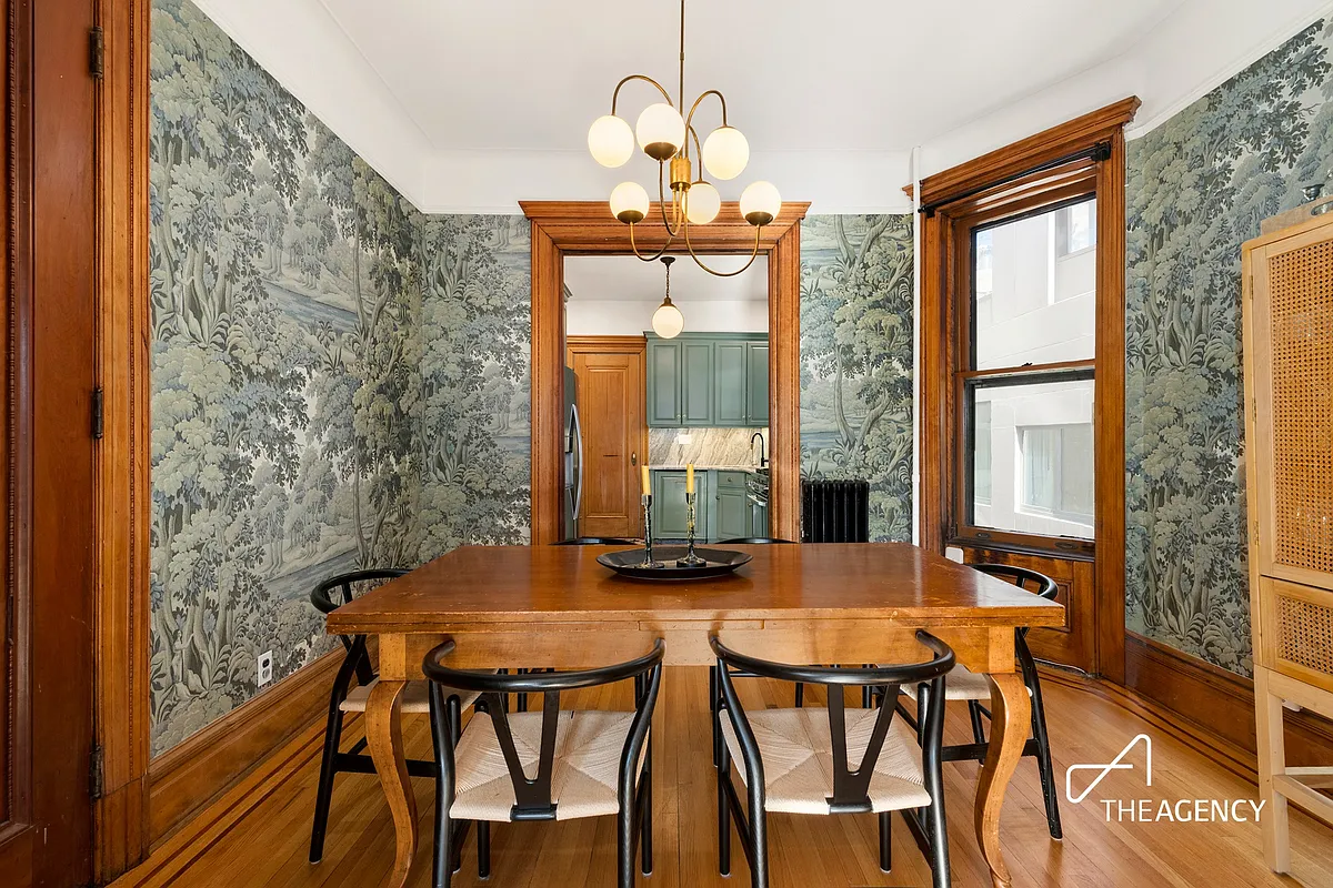 dining room with landscape wallpaper