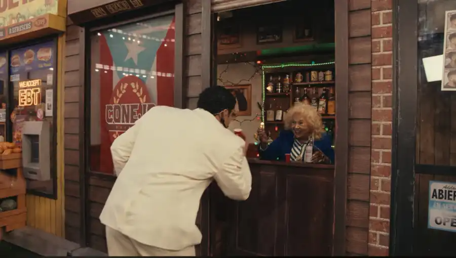 a woman serving a drink