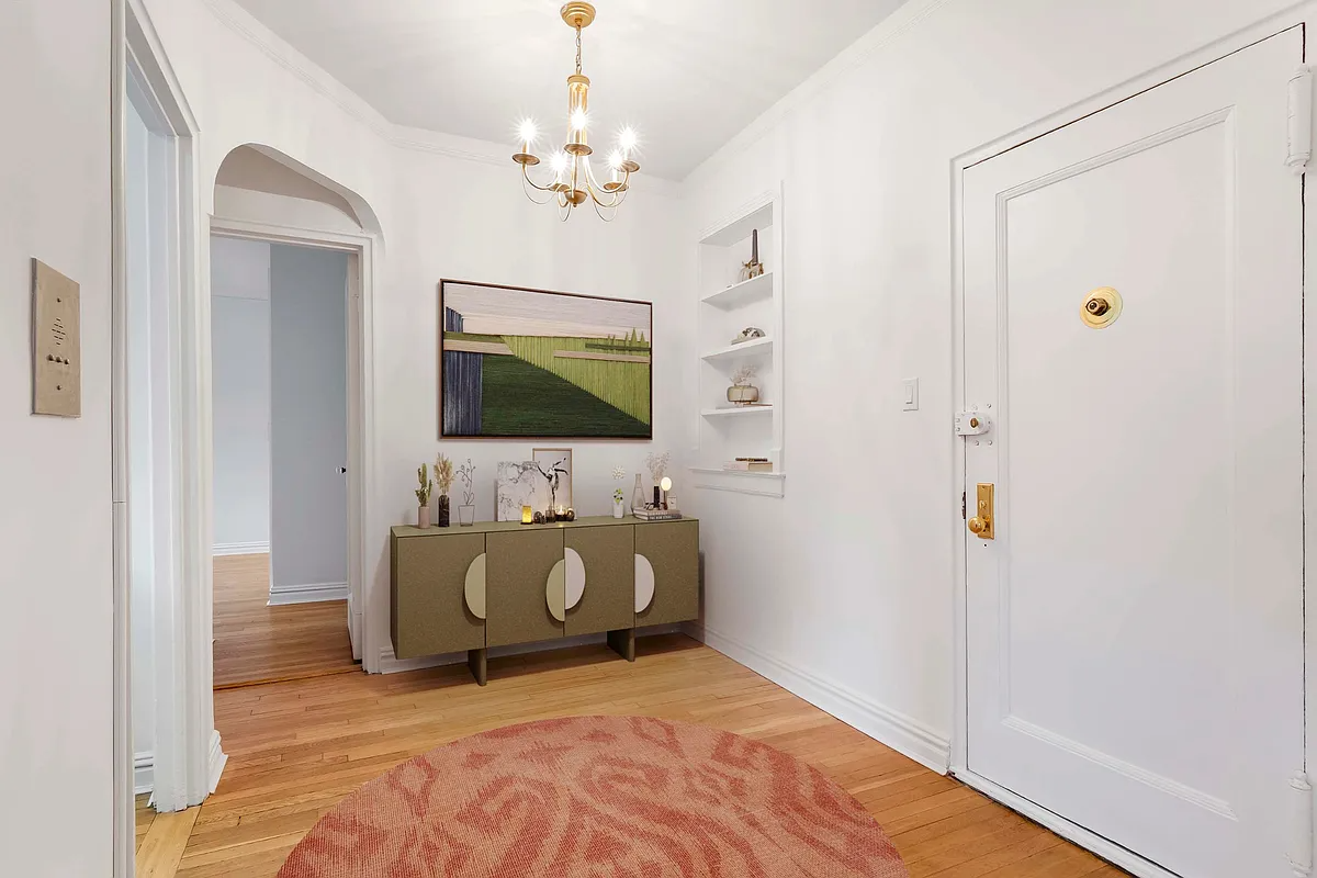 staged foyer with sideboard