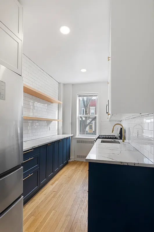 kitchen with blue base cabinets