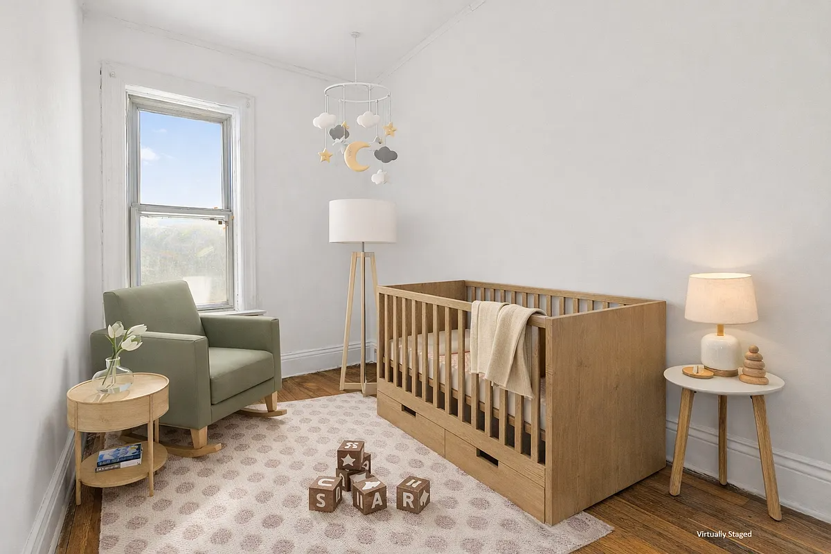 bedroom virtually staged as a nursery