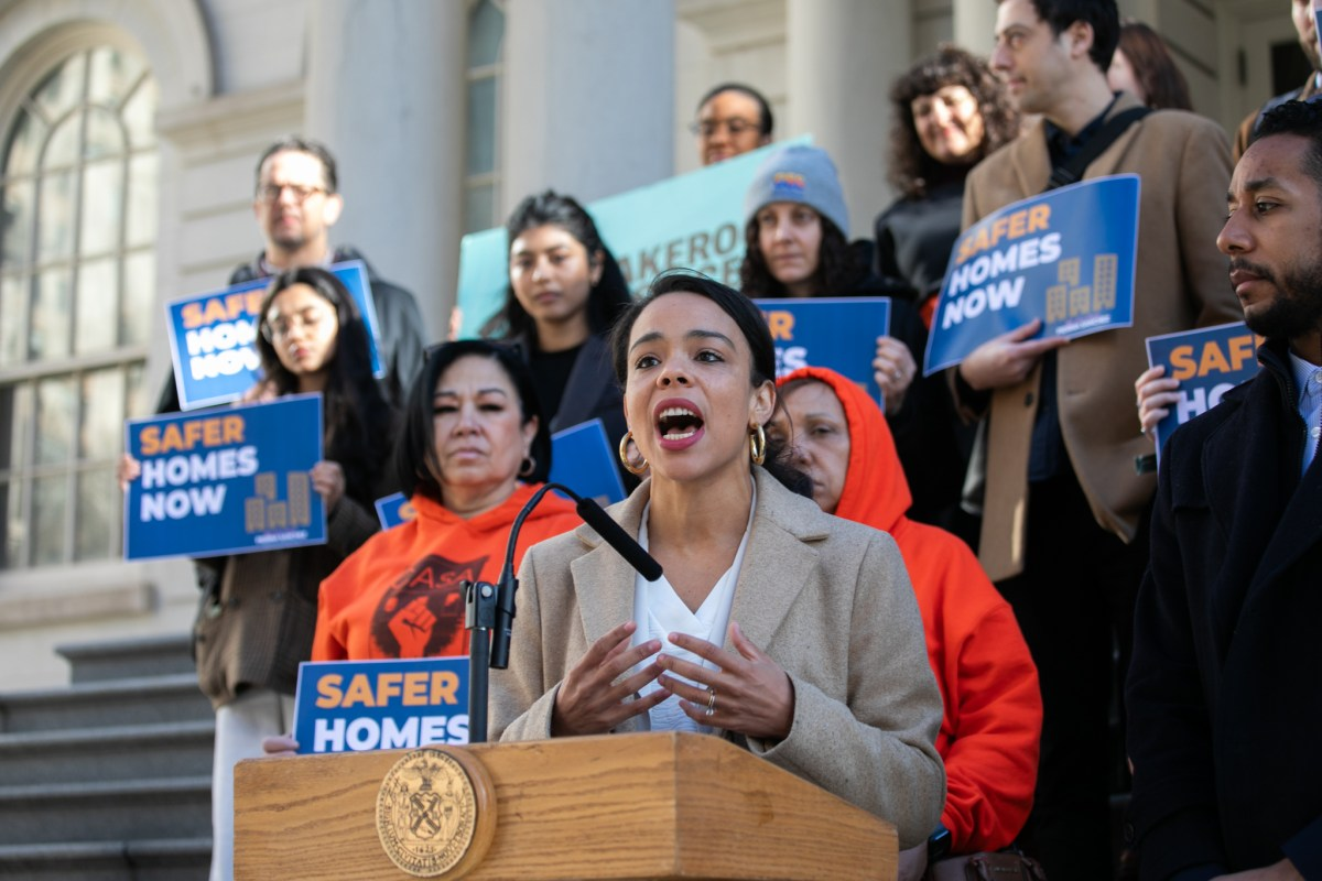 person speaking at a podium