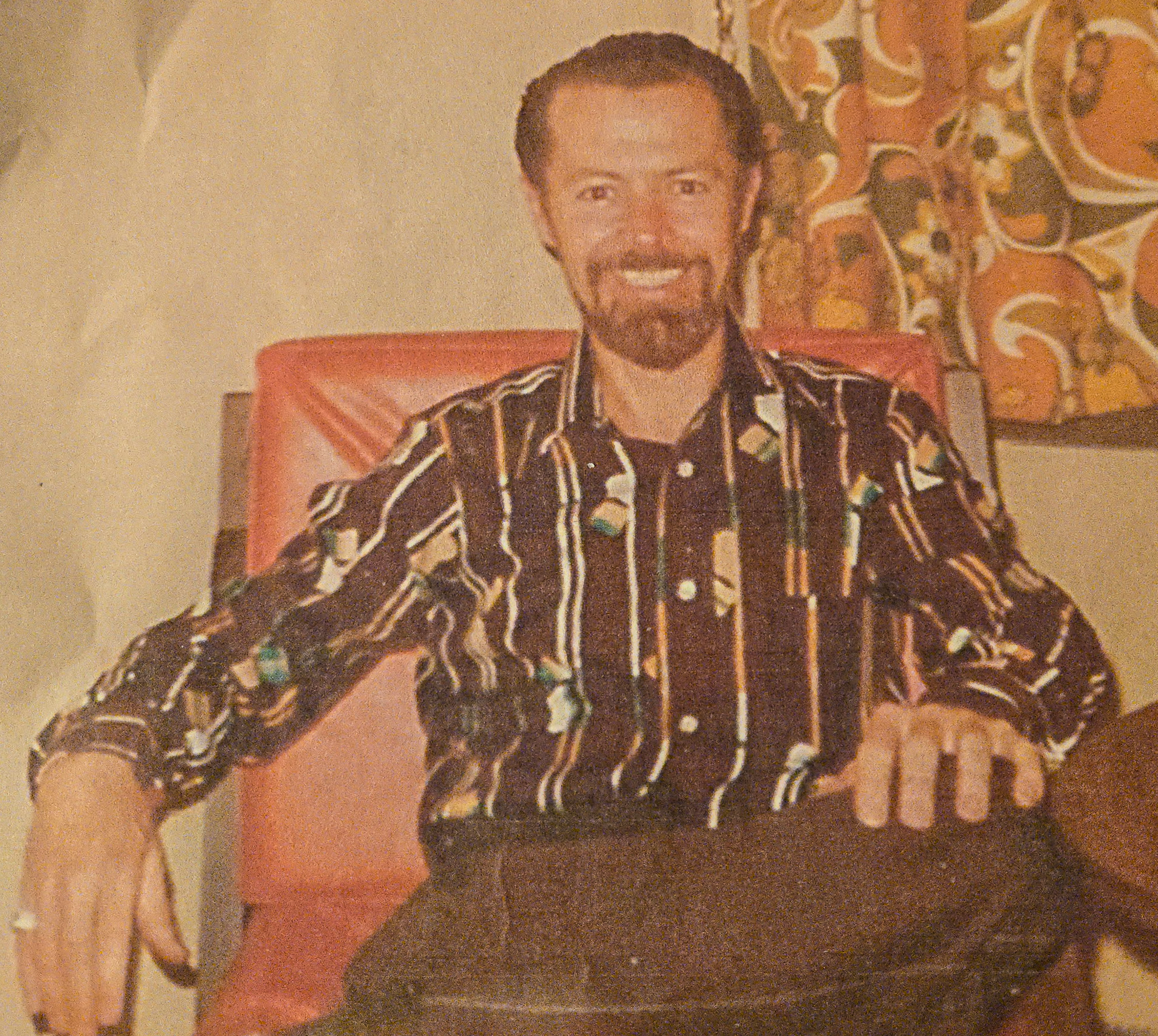 man in a striped shirt