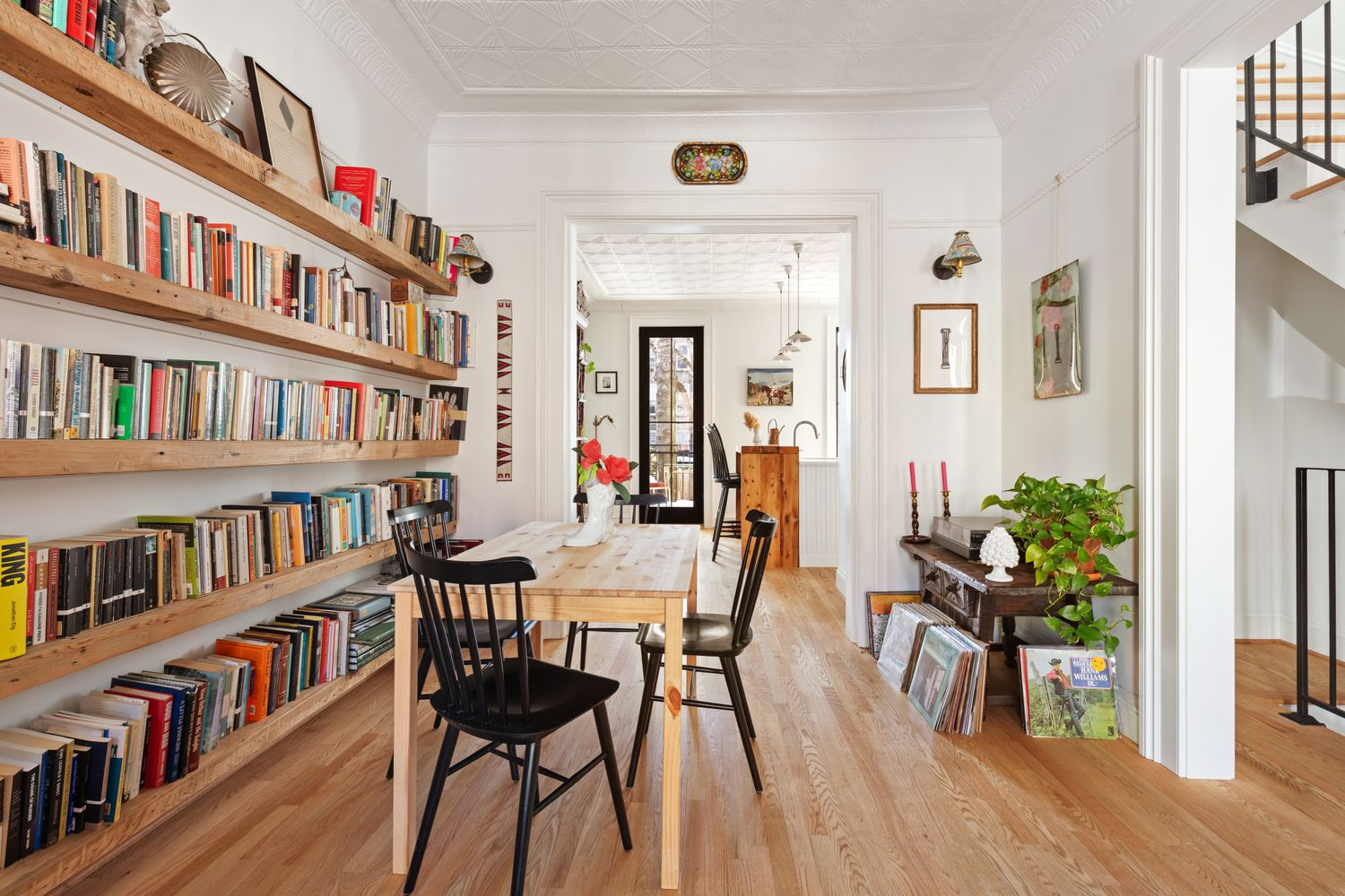 living room with room for dining, view into kitchen