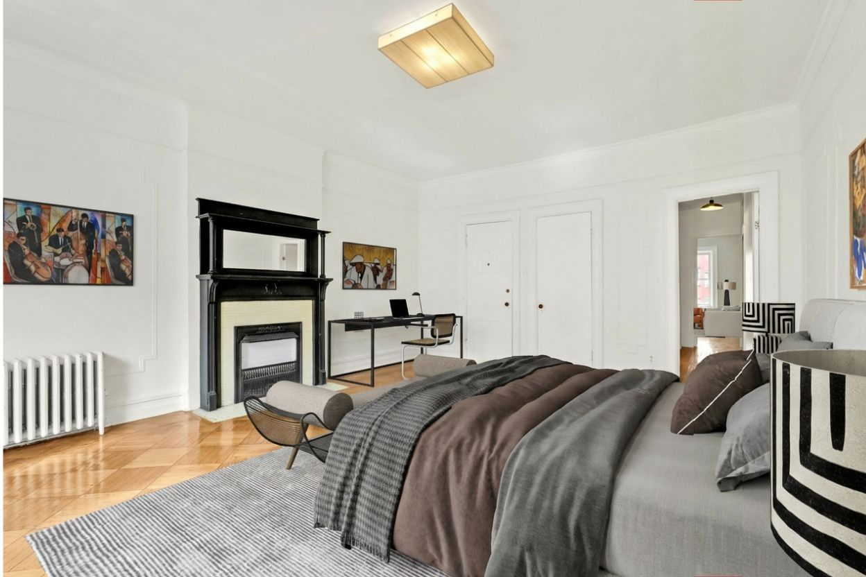 bedroom with a wood mantel