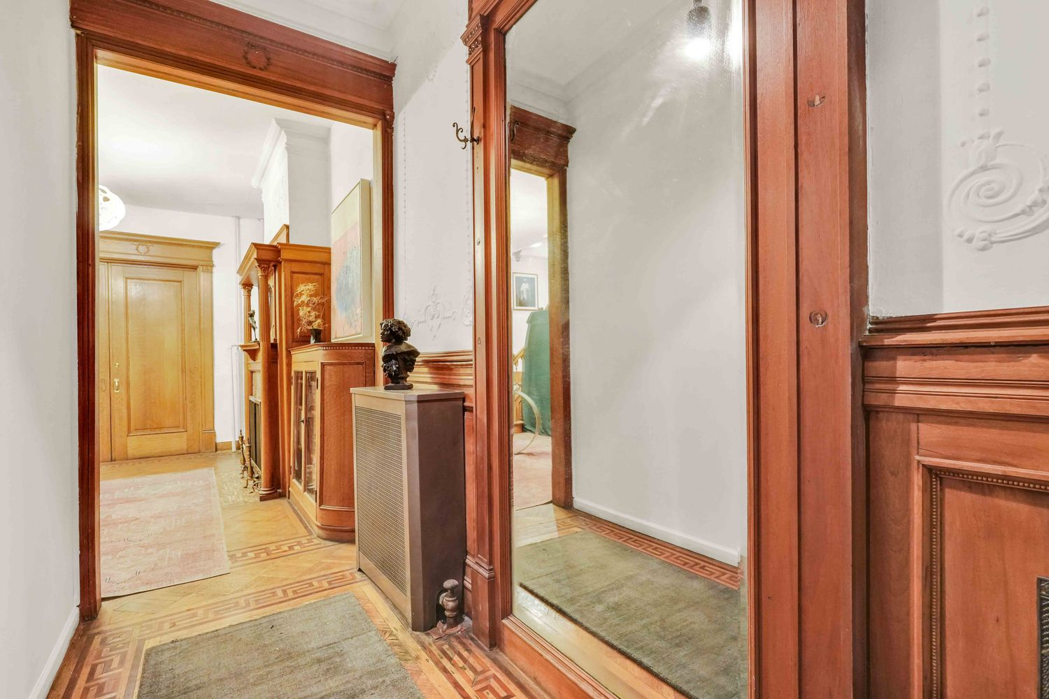 parlor level entry with mirror