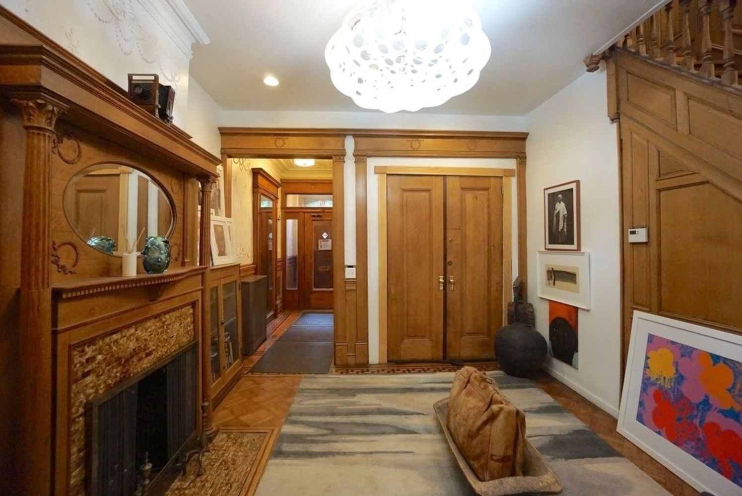 middle parlor with mantel, staircase