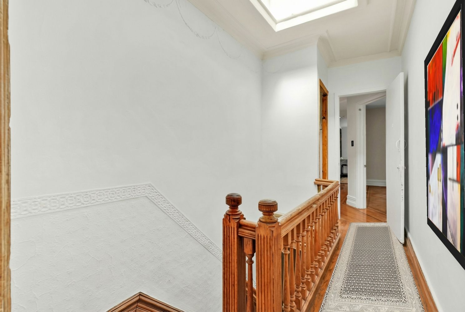 hallway with skylight