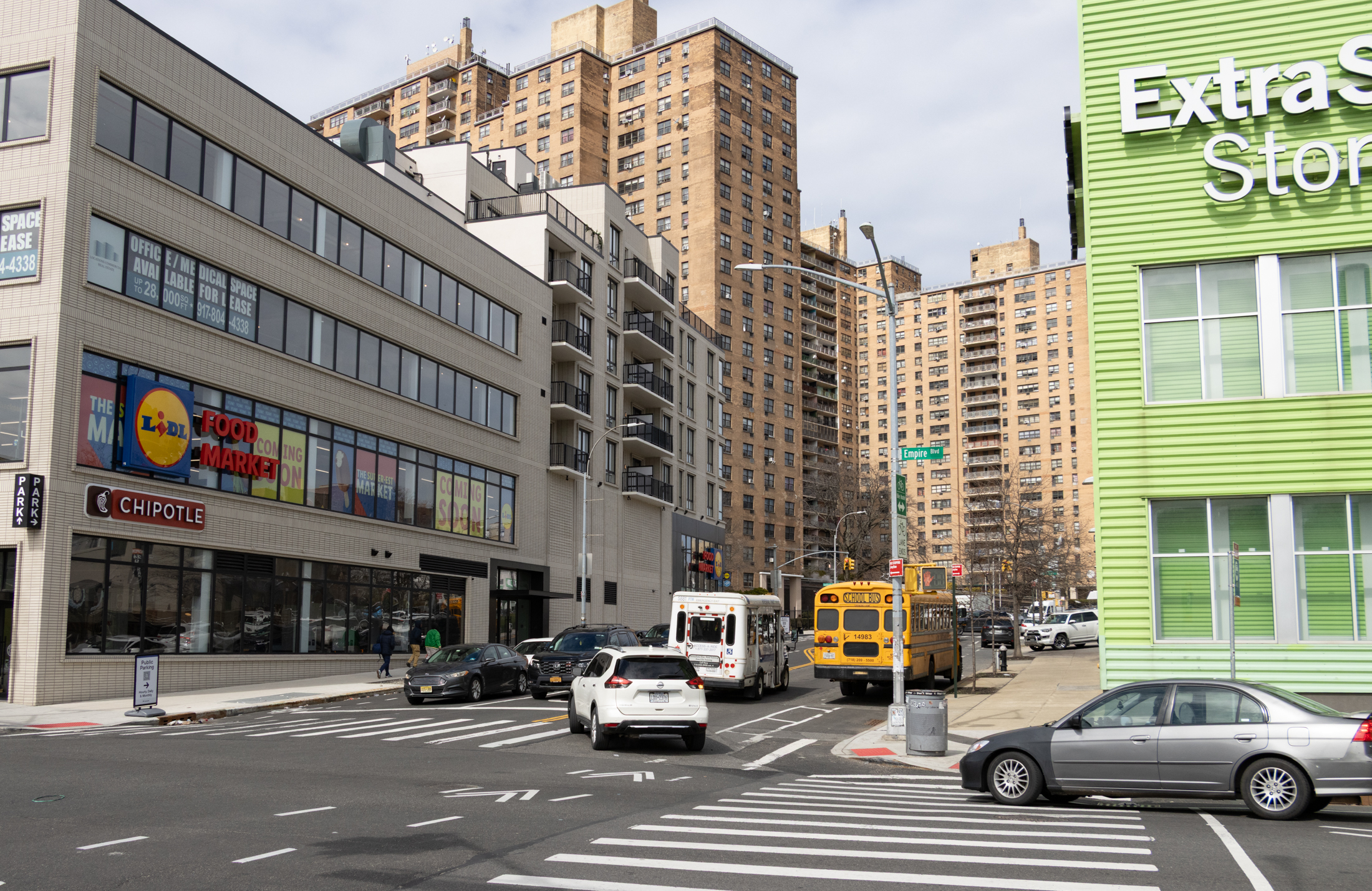 view of new construction with a chipotle and a lidl grocery store