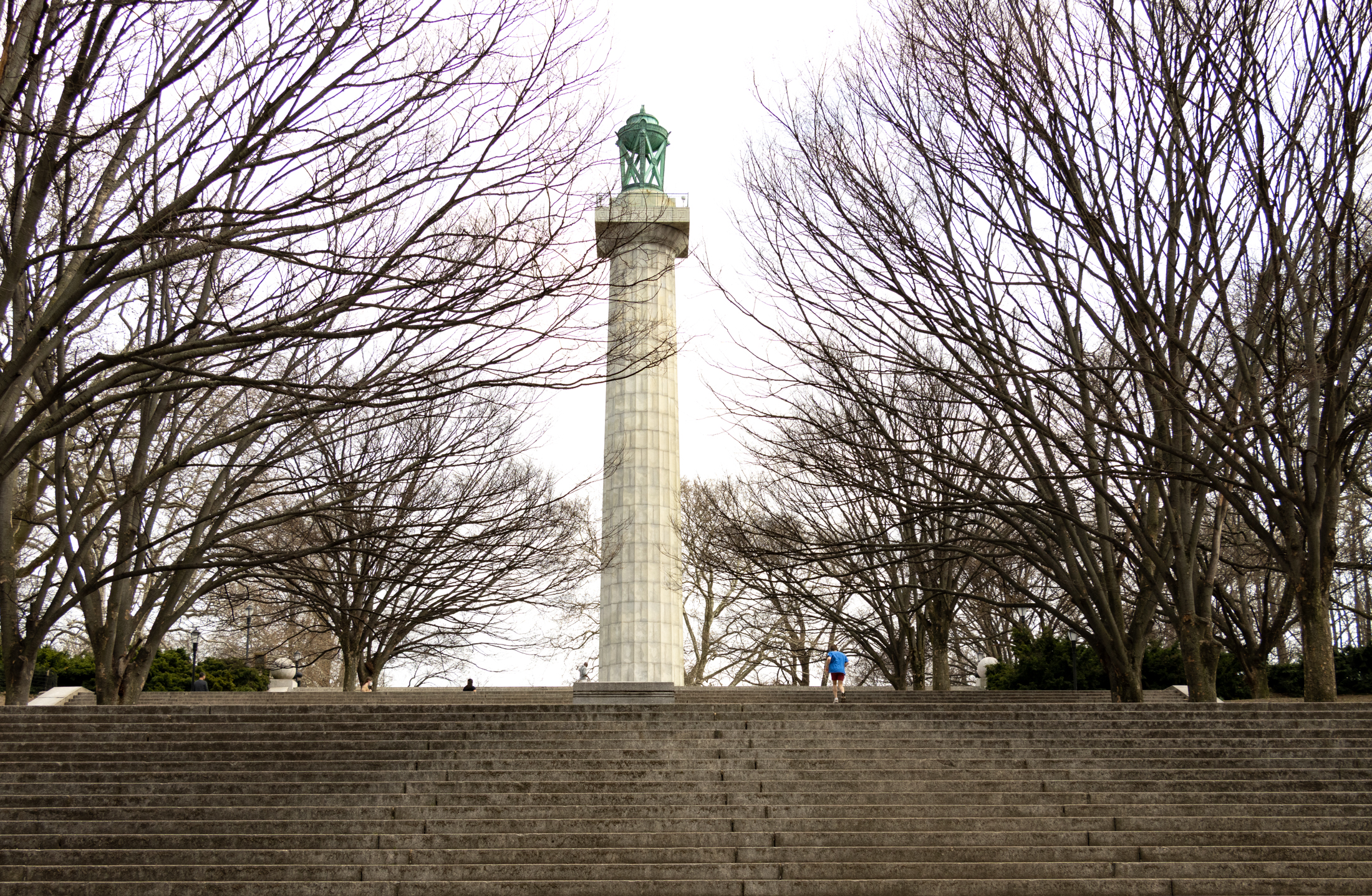 brooklyn - person running up steps to monument in fort greene park