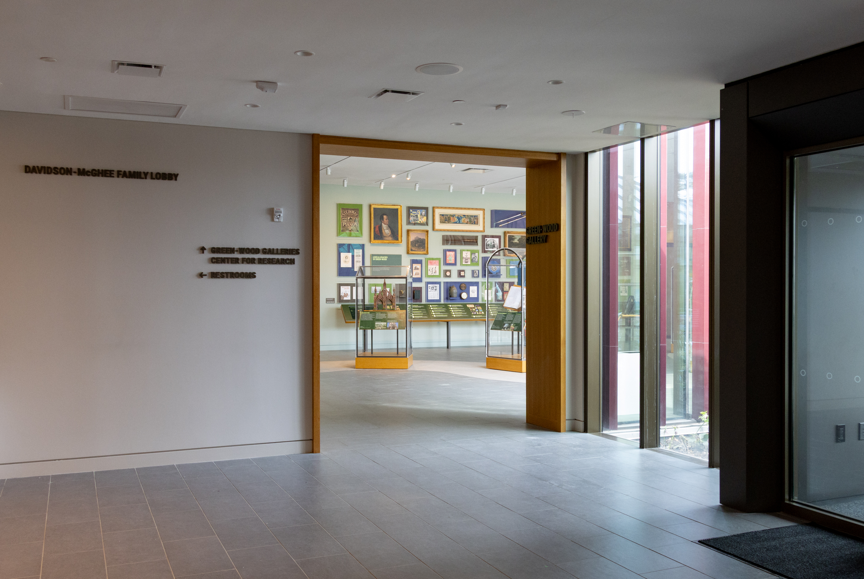 building interio with a glimpse of an exhibition space